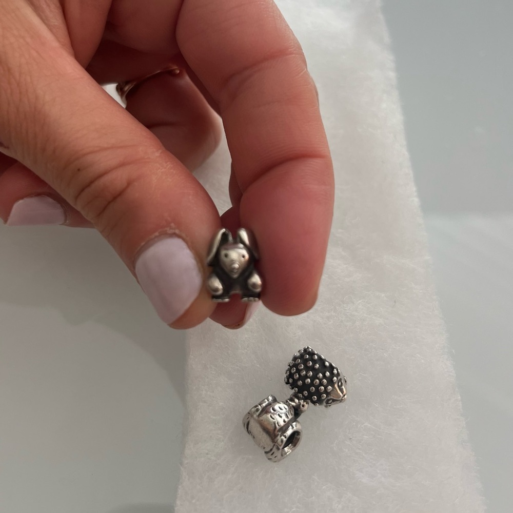 Pandora bunny charm with ALE trademark.